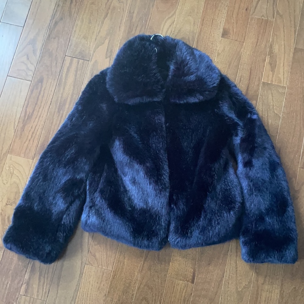 The beautiful faux fur dark blue Piano coat from Reformation!